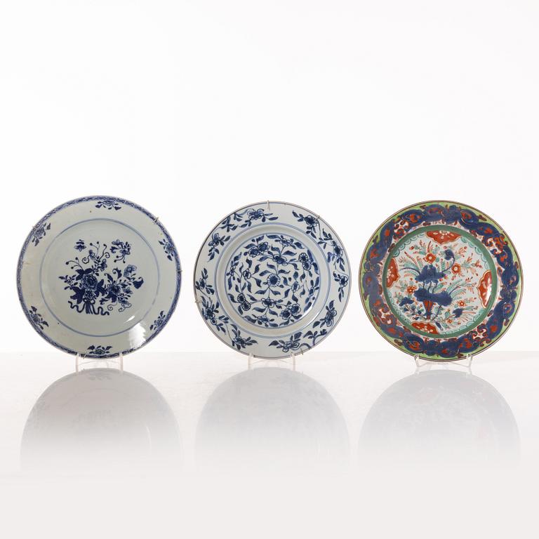 A group  of three serving dishes, a serving bowl, a cup, and seven plates, porcelain, including China 18th century.