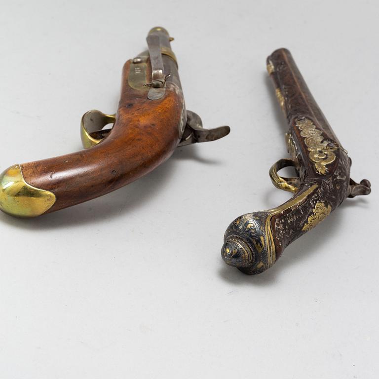 Two 19th Century pistols.