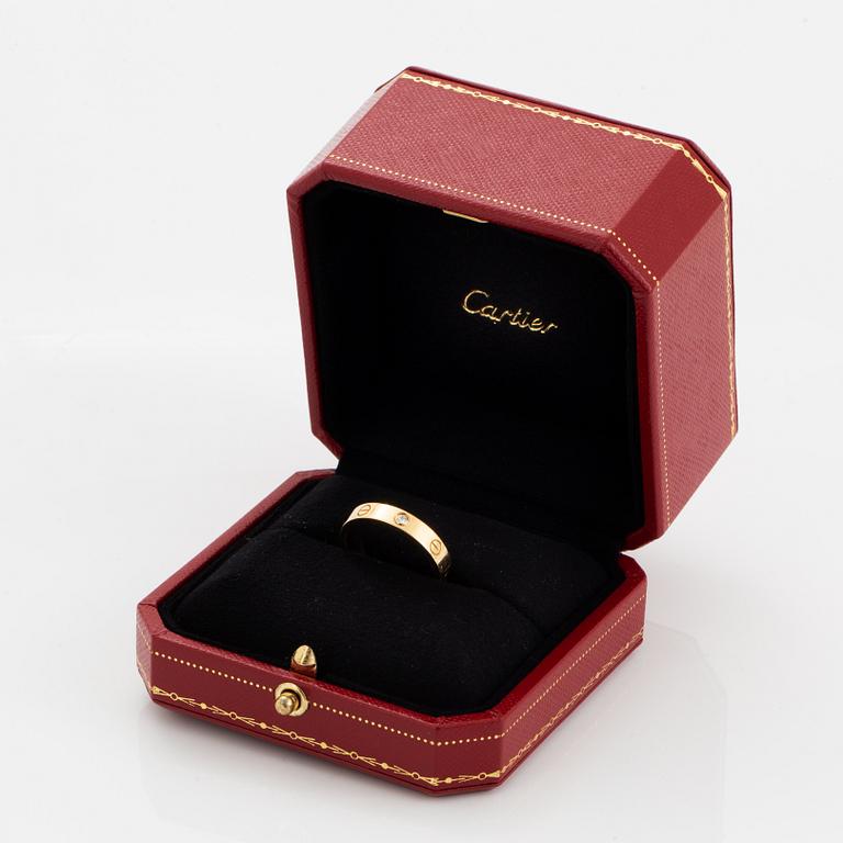 Cartier ring "Love" 18K guld med en rund briljantslipad diamant.