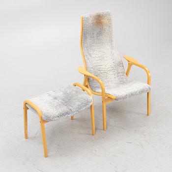 Yngve Ekström, armchair with footstool, Lamino, Swedese, late 20th century.