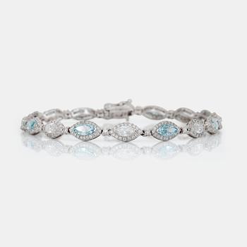 662. A colourless marquise-cut and blue treated diamond bracelet.