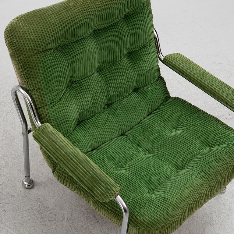 Bo Eigert, a pair of "Stålbo" armchairs, Firma B. Eigert AB, Hova, Sweden, 1970's.