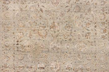 An Ushak Design, silk rug, a. 242 x 170 cm.