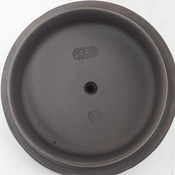 Two Chinese yixing ware teapots, 20th century.