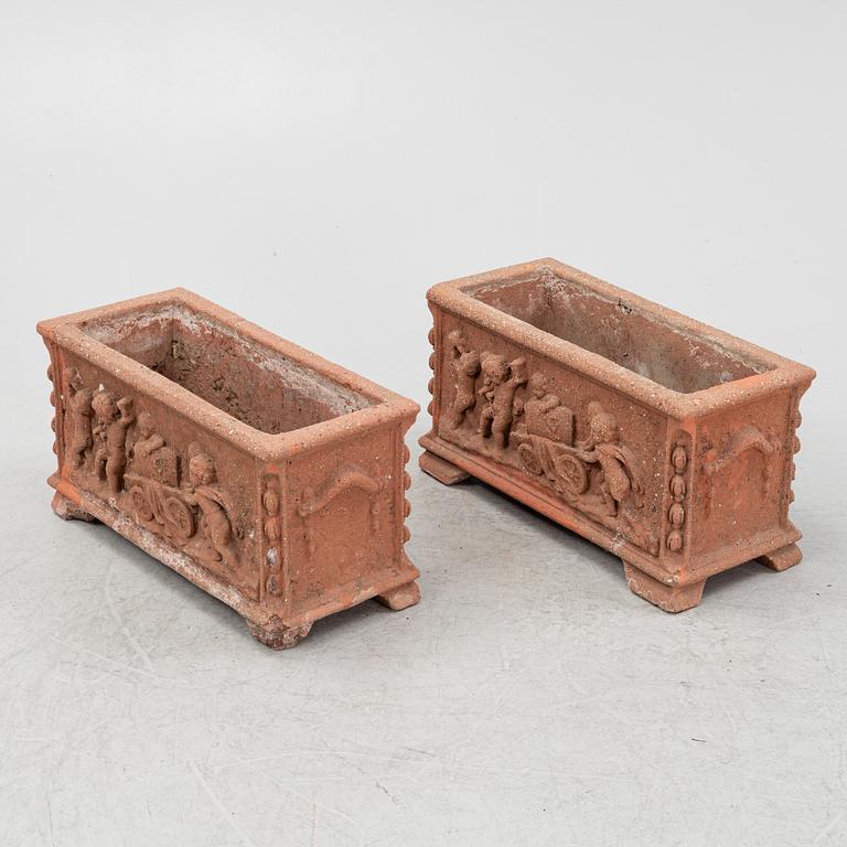 A pair of terracotta garden pots, 20th/21st Century.
