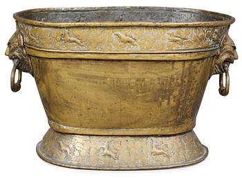 1105. A Baroque brass wine cooler.