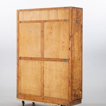 a roll top cabinet, mid 20th century.