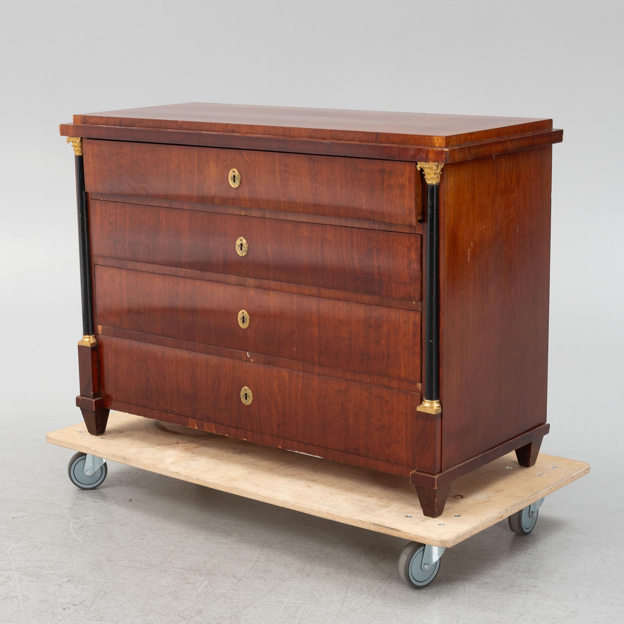 An Empire writing commode, early 19th century.