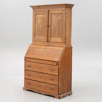 A two-part writing cabinet, around 1800.