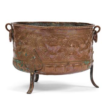 241. A Swedish baroque repousse copper cauldron, early 18th century.