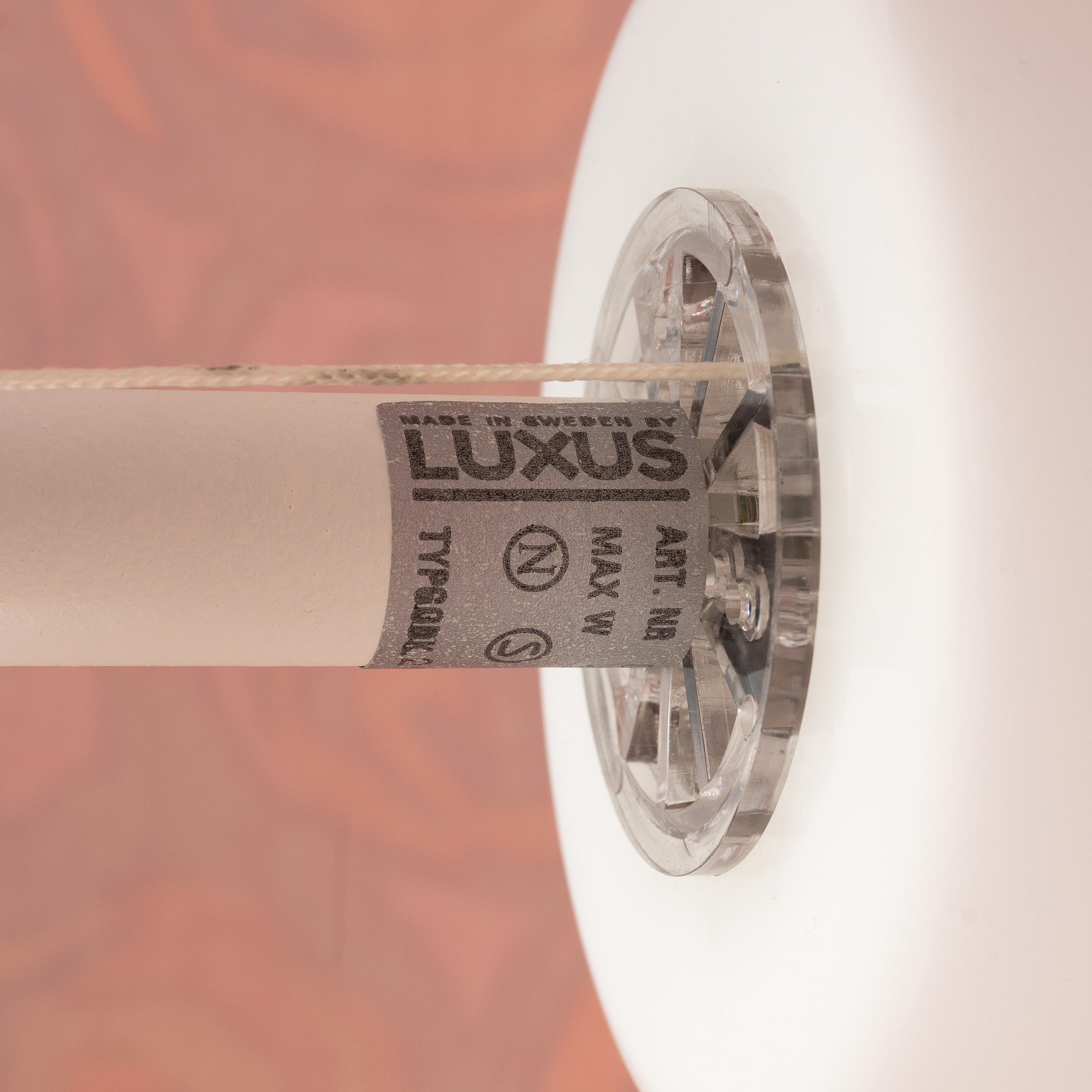 A white metal floor lights, Luxus, Vittsjö.