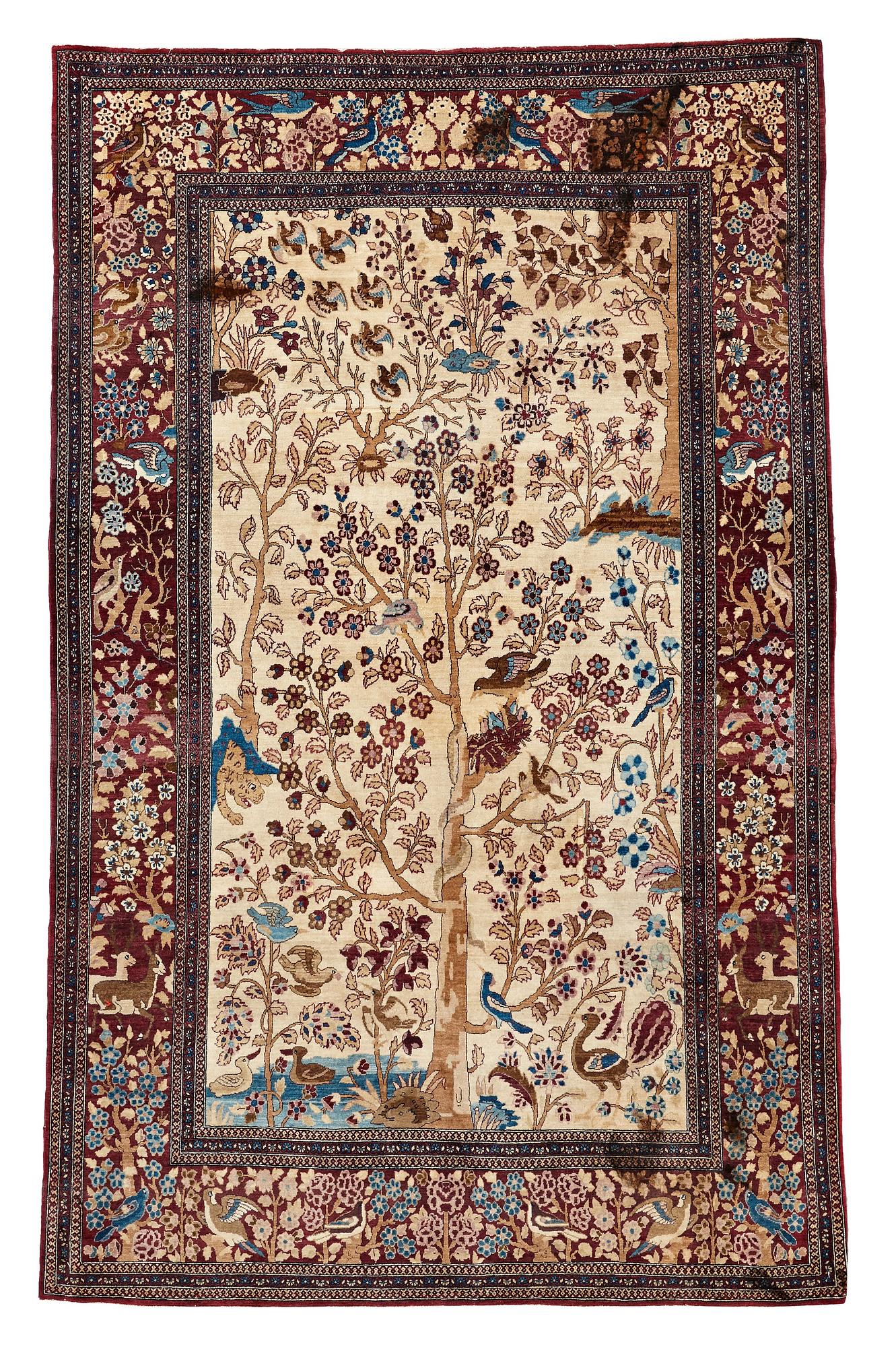 A RUG, a semi-antique Esfahan probably, figural, ca 214,5 x 137,5 cm.