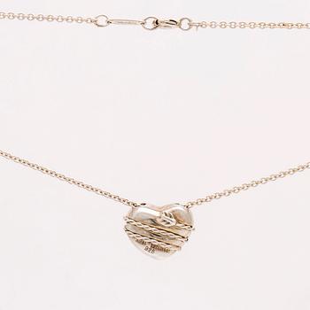 Tiffany 1 ring with a bow and heart pendant with chain, 1 more ring, sterling silver, total weight 20,8 g.