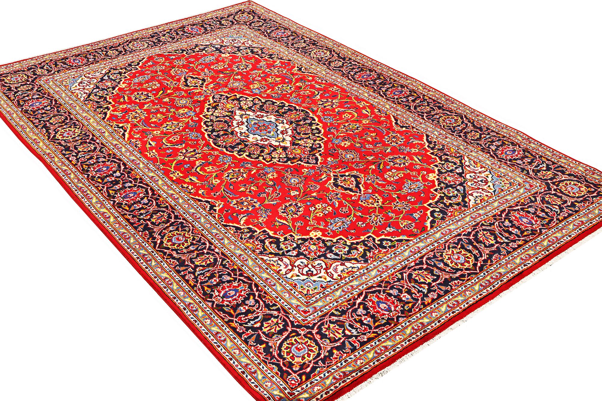 A Kashan carpet, a. 305 x 200 cm.