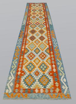 A runner, kilim, ca 487 x 83 cm.