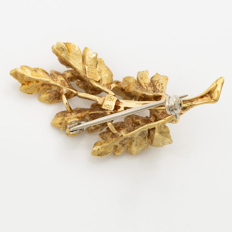 Brosch i form av ett löv 18K guld.
