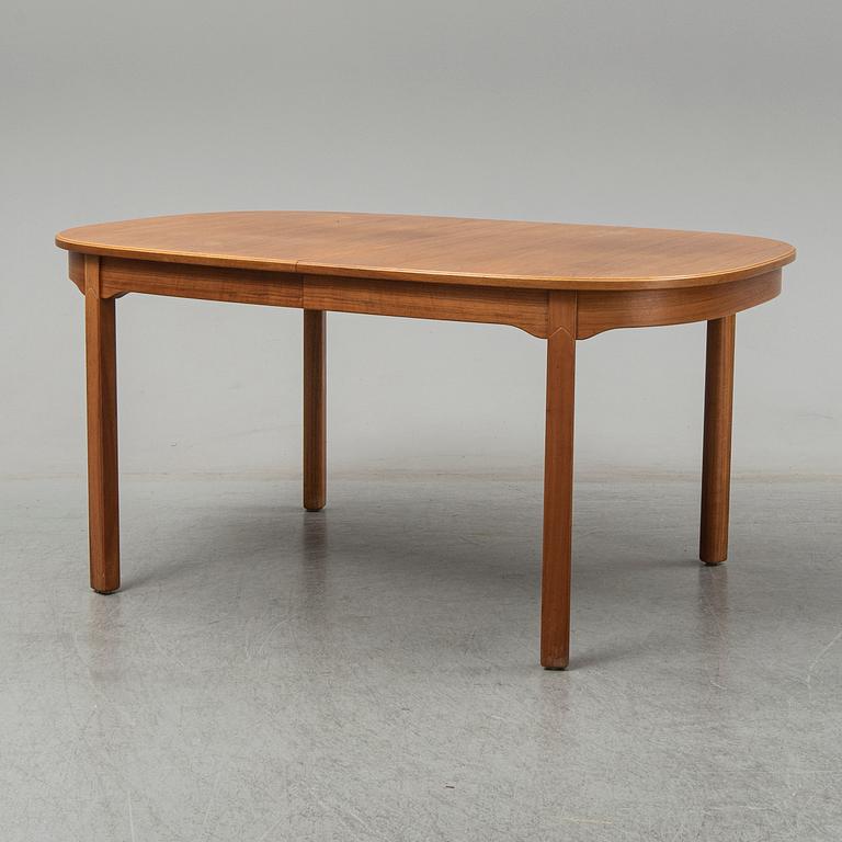A five-piece walnut 'Ambassadör' dining suite by Carl Malmsten.