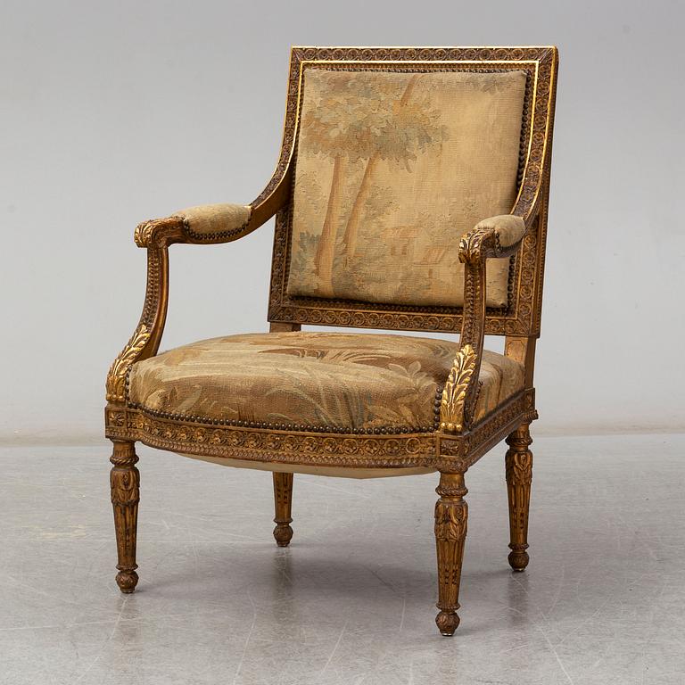 A late 19th century Louis XVI-style armchair.