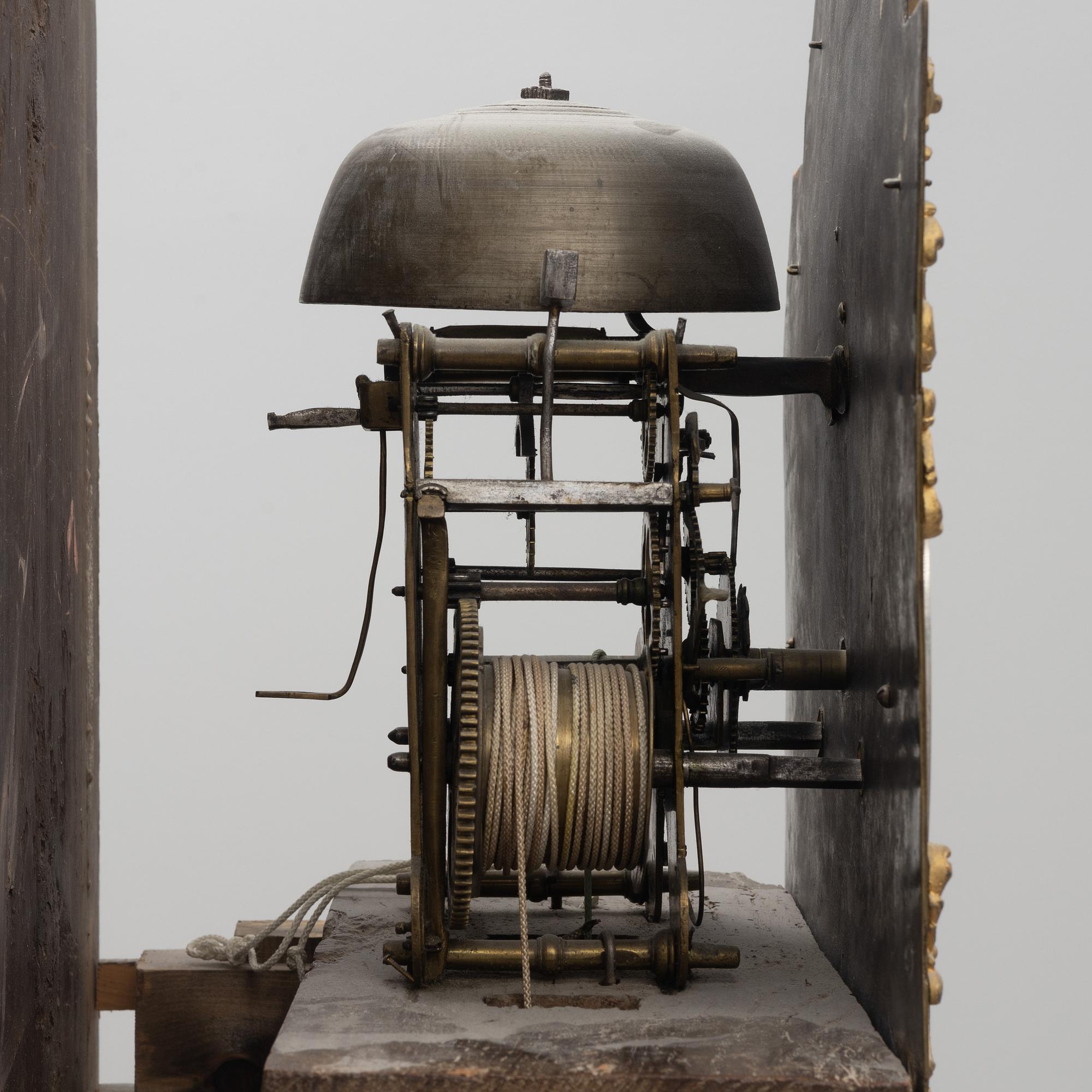 A 18th century longcase clock.