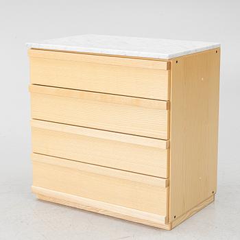 A contemporary chest of drawers.