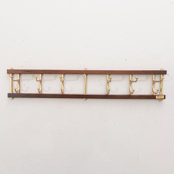 Klädhängare, "Dekorativ", AB Skogslunds metallgjuteri, Anderstorp, 1900-talets mitt.