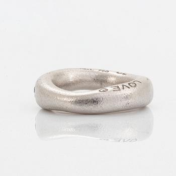 Ole Lynggaard "love ring" with brilliant-cut diamonds.