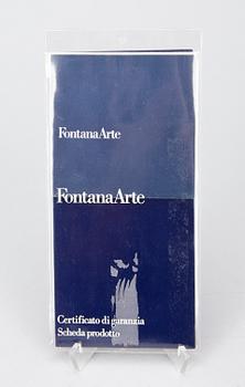 A Gae Aulenti 'Tavola con Ruote' table, Fontana Arte, Italy.