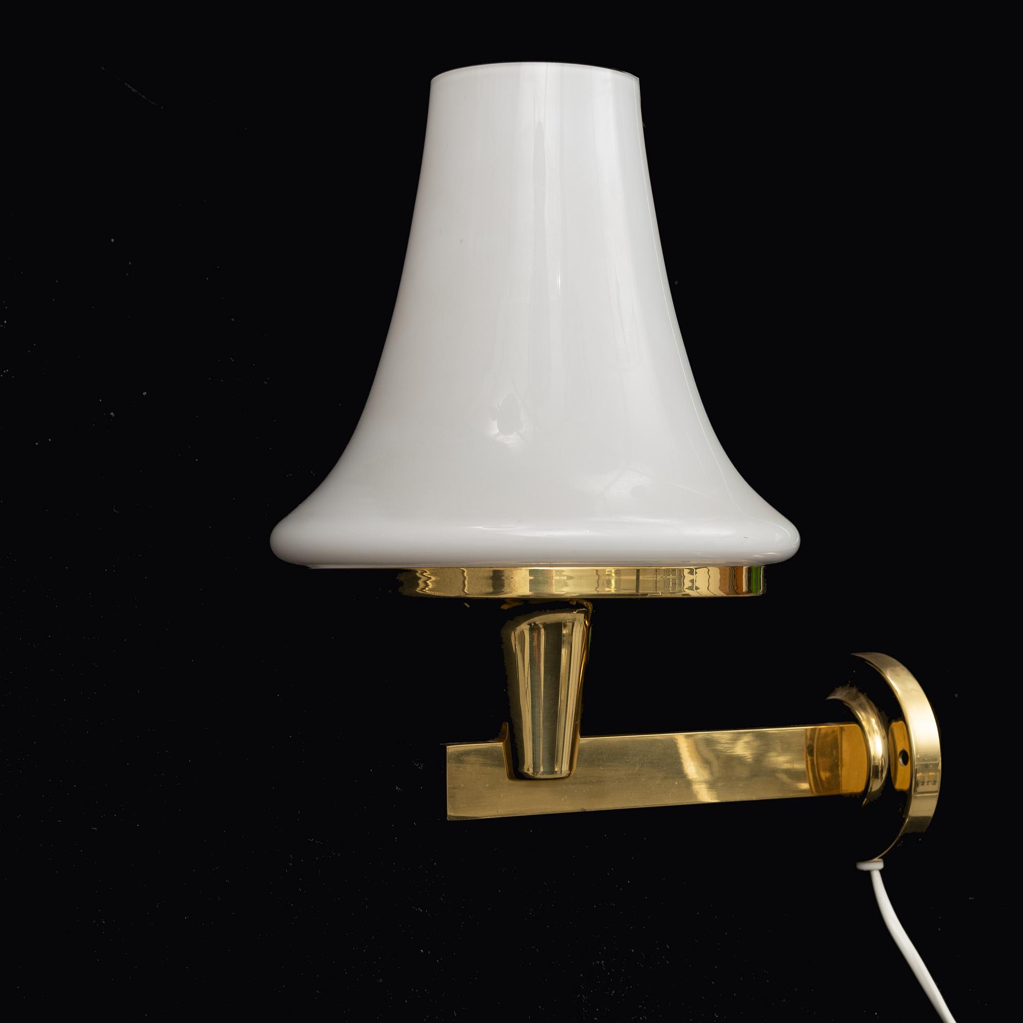 HANS-AGNE JAKOBSSON, a brass ceiling light and wall light from Markaryd, 1960's.