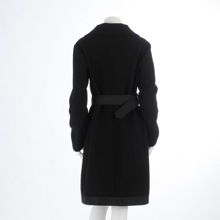 PRADA, a black wool coat, size 44.