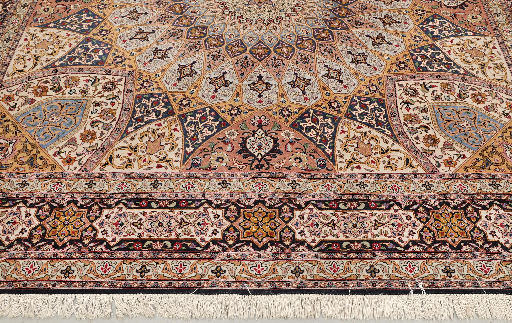 A part silk Tabriz carpet, so-called 50 Raj, approx. 266 x 248 cm.