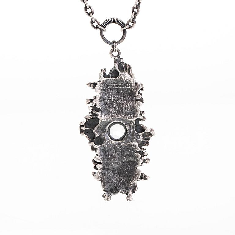Pentti Sarpaneva, a silver and rock crystal necklace, ring and earrings, Turun Hopea, Turku.