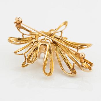 Brosch, guld med pärlor.