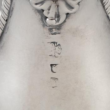An English 18th century silver sauce-boat, unidentified makers mark, London 1764.