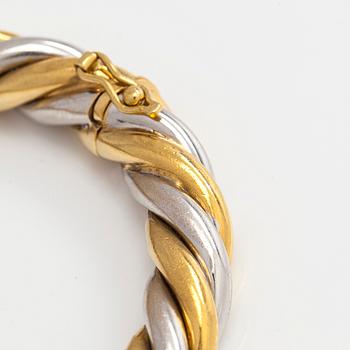 An 18K gold/white gold bracelet, Switzerland.
