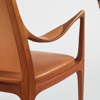 Hans Asplund, a walnut and leather easy chair, Nordiska Kompaniet, ca 1955, for the Nordiska Kompaniet beauty salon.