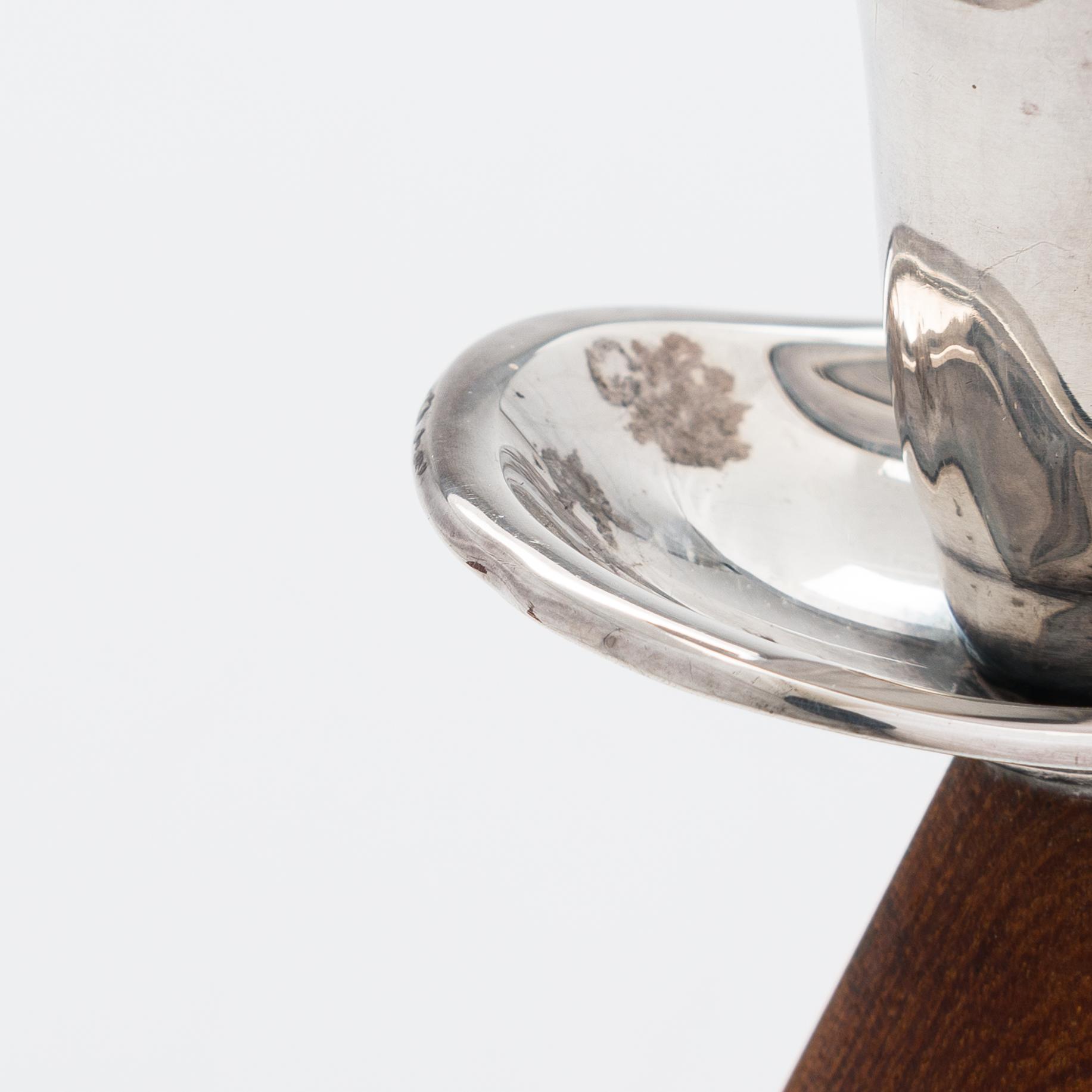 Two pairs of candlesticks, one designed by Saara Hopea, Kultakeskus, Hämeenlinna 1965.