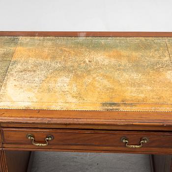 A 20th century writing desk, England.