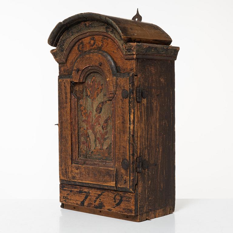 A wall cabinet, West Swedish folk art, 18th century.