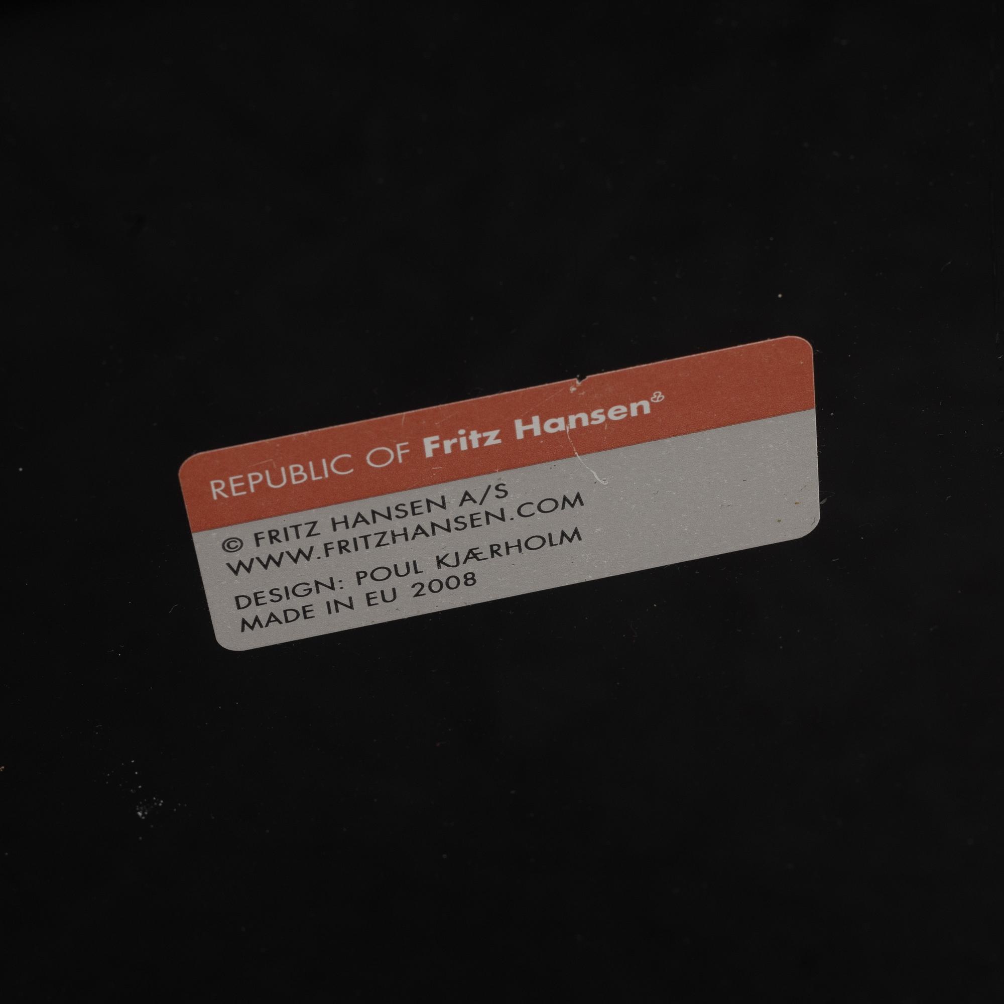 Poul Kjaerholm, a 'PK-71' nest table from Fritz Hansen, 2008.