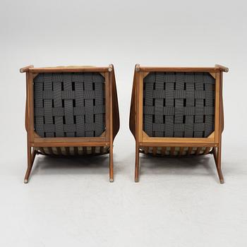 Folke Ohlsson, a pair of 'USA 75' armchairs, Dux, 1960's.