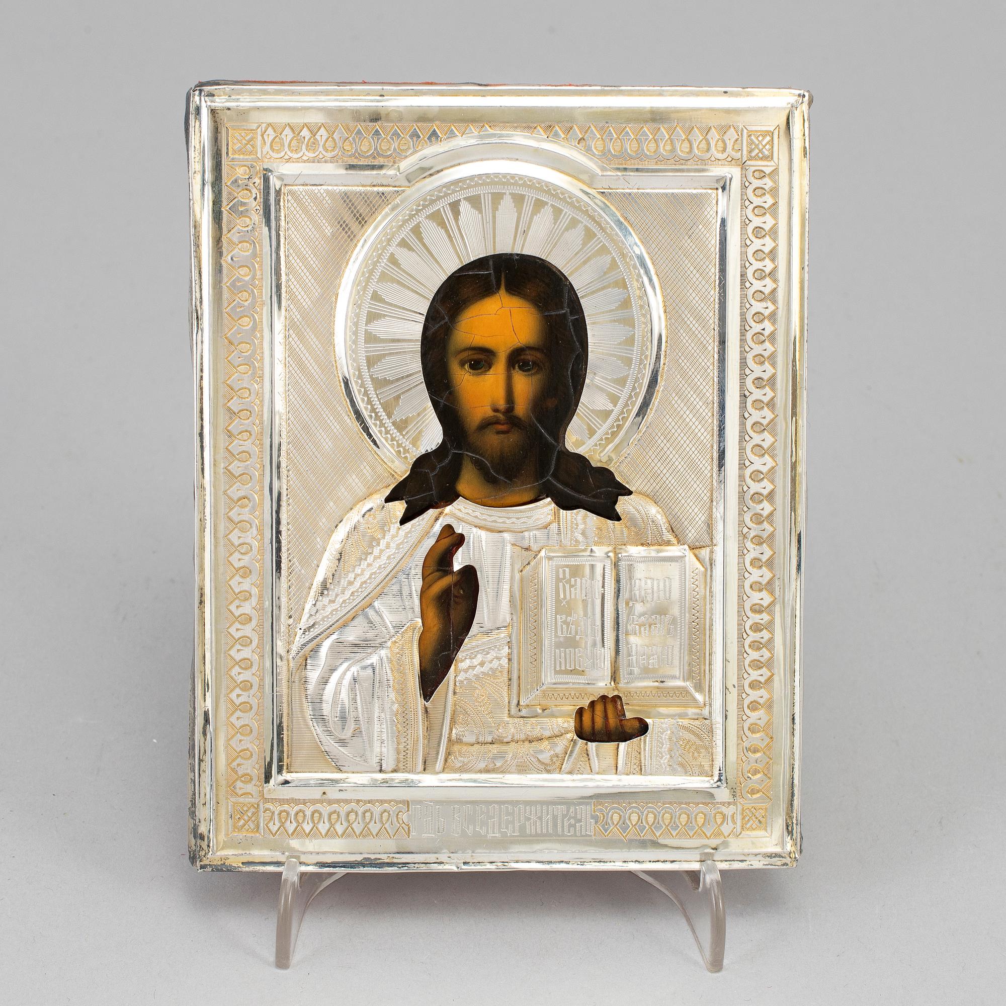 A Russian early 20th century parcel-gilt silver icon, unidentified makers mark, Moscow 1899-1908.