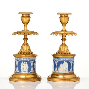 A pair of George III ormolu and jasperware candlesticks, late 18th century.