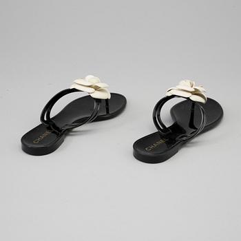 CHANEL, a pair of black plastic sandals. Size 38.