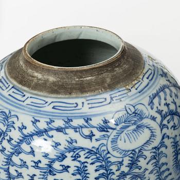 Two similar Chinese blue and white porcealin jars with wooden covers, Qing dynasty, 19th Century.