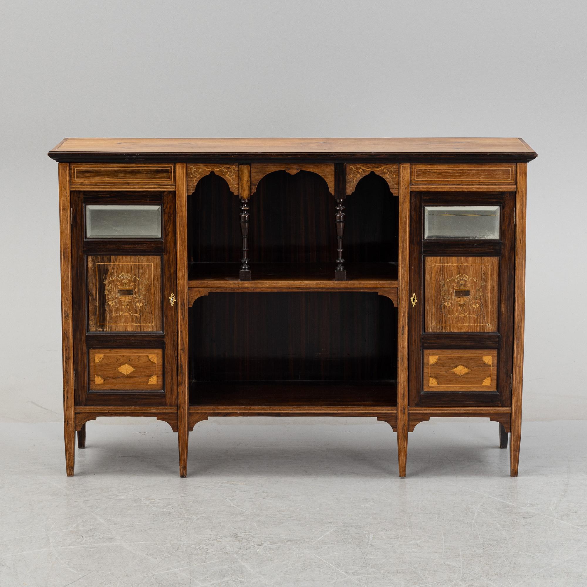 A rosewood veneered sideboard by James Shoolbred & Co, London, circa 1900.