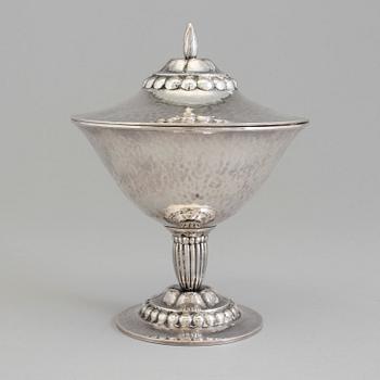 A Swedish Art Nouveau silver lidded bowl on stand, maker's mark CF Carlman, Stockholm, 1919.