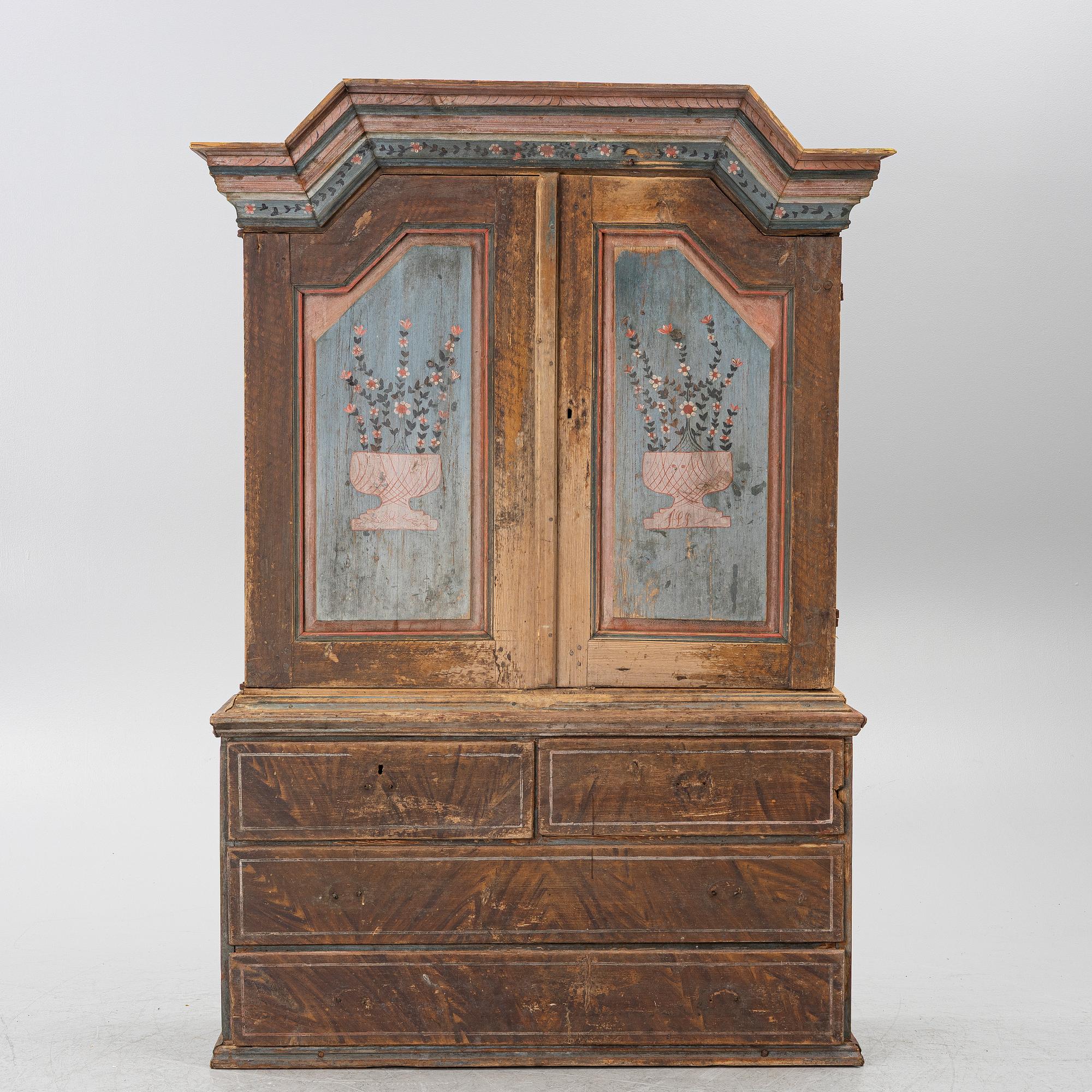 A folk-art cabinet attributed to  "Gammelmålaren" Anders Nilsson (Brunskog, 1807–1889).