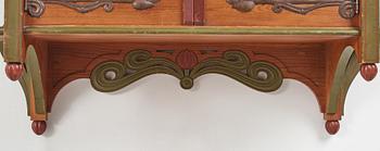 A Swedish Art Nouveau painted shelf executed by A． Lagerberg, 1897.