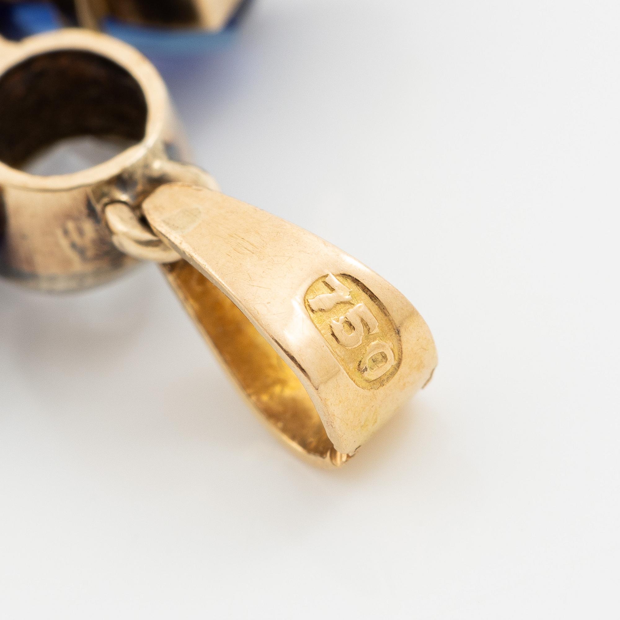 Pendant, 18K gold with carved sapphires, white sapphire, and a small rose-cut diamond.