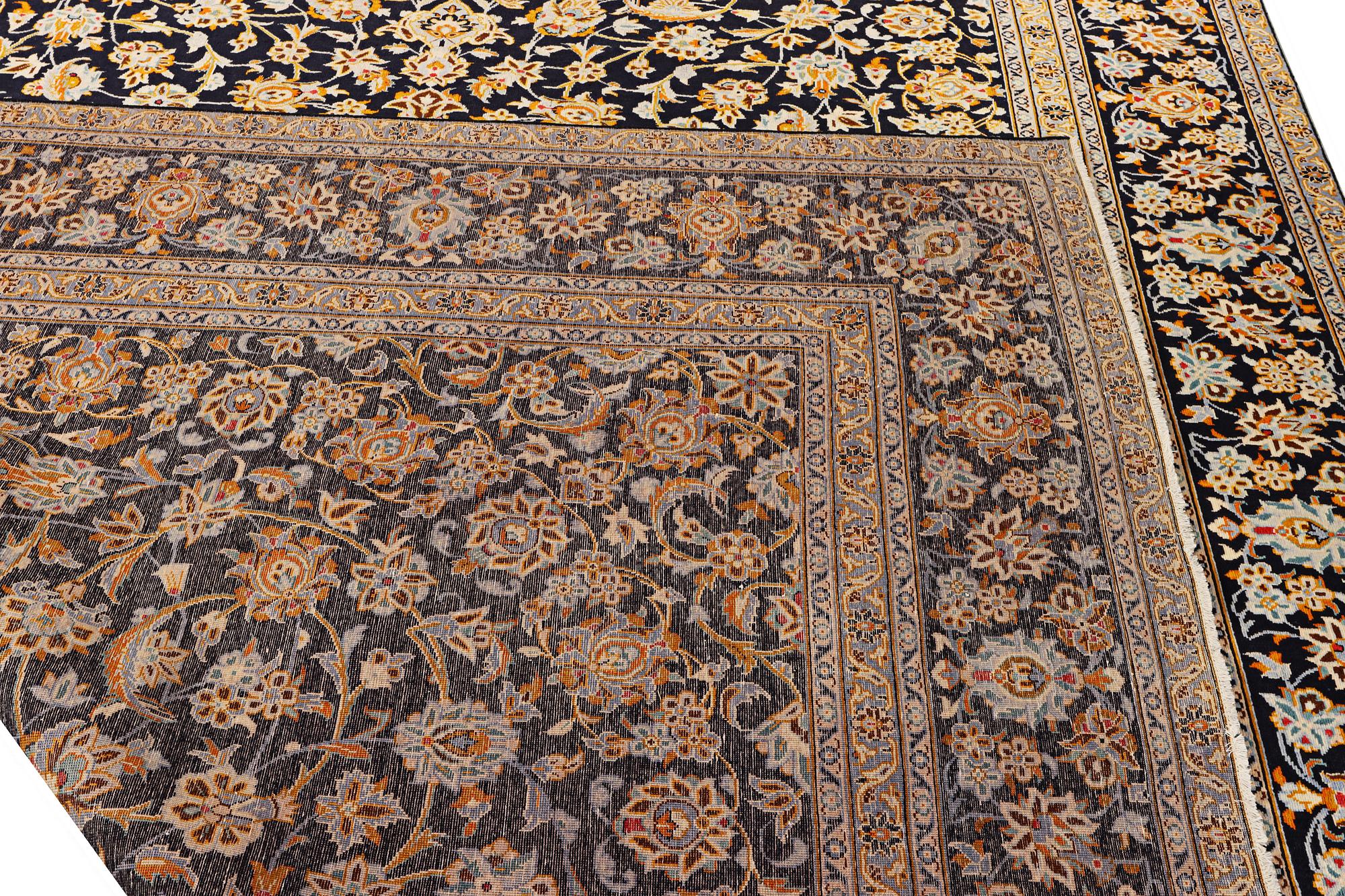 A Kashan carpet, a. 405 x 290 cm.